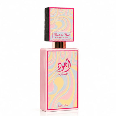 Lattafa Ajwad Pink 2 Pink Creamy Elixir EDP — Botol segi empat pink dengan corak berombak berwarna-warni, di atasnya penutup hitam lebih kecil dengan reka bentuk berombak serupa dan aksen emas.