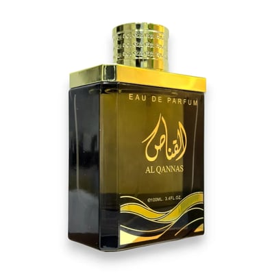 Ard Al Zaafaran Al Qannas Eau De Parfum 100ml — A blue perfume bottle and its matching blue box with gold Arabic calligraphy and wavy lines, displayed side-by-side on a white background. | Ard Al Zaafaran Al Qannas Eau De Parfum 100ml — Botol minyak wangi biru dan kotak birunya yang sepadan dengan kaligrafi Arab emas