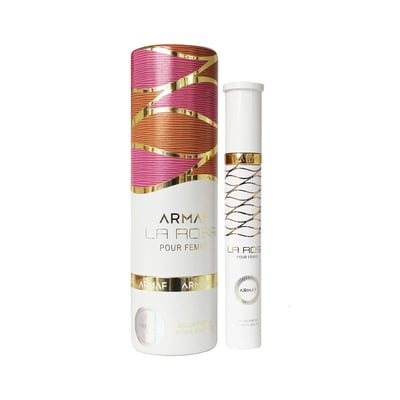 Armaf La Rosa Eau De Parfum 10ml — A tall cylindrical perfume tube with pink and brown patterned wrapping and gold accents stands next to a slim white perfume bottle with gold wavy lines. | Armaf La Rosa Eau De Parfum 10ml — Tiub minyak wangi silinder tinggi dengan balutan bercorak merah jambu dan coklat serta aksen