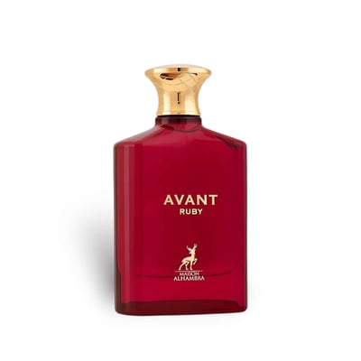 Maison Alhambra Avant Ruby Eau De Parfum 100ml — A bright pink glass perfume bottle with a gold textured cap stands next to its white and gold patterned box, both featuring the Avant Ruby branding and a deer logo. | Maison Alhambra Avant Ruby Eau De Parfum 100ml — Botol kaca berwarna merah jambu terang dengan penutup