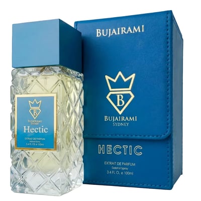 Bujairami Hectic — Clear faceted glass perfume bottle with blue cap next to blue presentation box with gold logo
