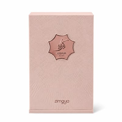 Zimaya Kibria Glory — Rose gold perfume bottle with crown cap and matching textured box, both featuring embossed Arabic script and 'KIBRIA GLORY' text.