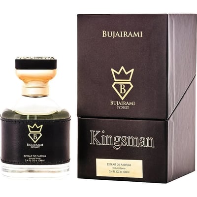 Bujairami Kingsman — A clear glass perfume bottle with a black leather band and gold accents sits next to its dark brown