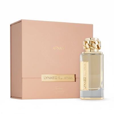 Afnan Lynked Forever by Afnan 100ml Eau De Parfum — A gold-capped perfume bottle stands next to its rose gold box with
