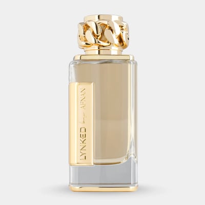 Afnan Lynked Forever by Afnan 100ml Eau De Parfum — A gold-capped perfume bottle stands next to its rose gold box with