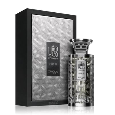 Zimaya Modhesh Noble 100ml — A silver patterned gift box stands next to a matching silver patterned perfume bottle with a metallic cap, both on a white background. | Zimaya Modhesh Noble 100ml — Kotak hadiah bercorak perak berdiri di sebelah botol minyak wangi bercorak perak yang sepadan dengan penutup logam