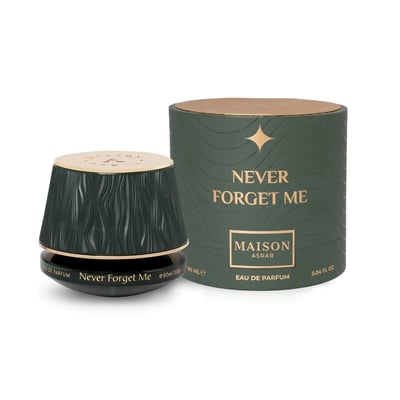 Maison Asrar Never Forget Me by Maison Asrar 90ml EDP Women — Green textured box lid open, revealing a dark bottle with gold accents and textured interior.