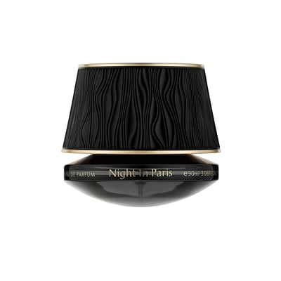 Maison Asrar Night In Paris — Black textured perfume bottle with gold lid next to its cylindrical black and gold box, both featuring wavy patterns and gold text.