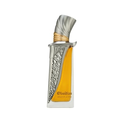 French Avenue Obsidian Eau De Parfum 100ml — A gold and black perfume bottle with ornate gold detailing stands next to its matching black box with gold artistic accents. | French Avenue Obsidian Eau De Parfum 100ml — Botol minyak wangi emas dan hitam dengan perincian emas berukir berdiri di sebelah kotak hitamnya yang