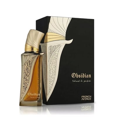French Avenue Obsidian Eau De Parfum 100ml — A gold and black perfume bottle with ornate gold detailing stands next to its matching black box with gold artistic accents. | French Avenue Obsidian Eau De Parfum 100ml — Botol minyak wangi emas dan hitam dengan perincian emas berukir berdiri di sebelah kotak hitamnya yang