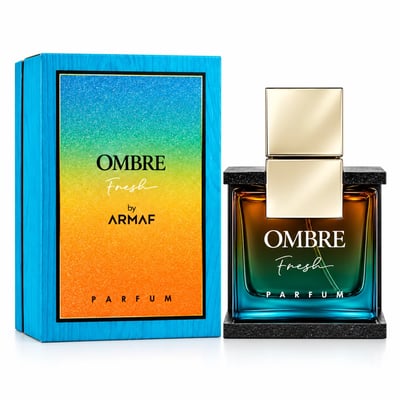 Armaf Ombre Fresh by Armaf 100ml EDP Unisex — Square glass bottle with ombre gradient from orange to blue, gold cap, displayed in a textured black holder.