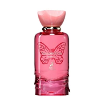 Maison Alhambra Papillon D'Or 100ml Maison Alhambra — A red glass perfume bottle with a pink cap sits next to its matching bright pink box, which features a gold butterfly design. | Maison Alhambra Papillon D'Or 100ml Maison Alhambra — Botol kaca merah dengan penutup merah jambu duduk bersebelahan dengan kotak merah