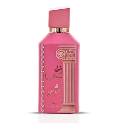 Ard Al Zaafaran Ahubbak Love In Paris EDP 100ml Zaafaran — Pink perfume bottle with a decorative column motif and gold accents, featuring Arabic script and "Love in Paris" text.