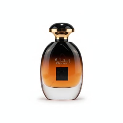 Perfume bottle with 'Rihanna' branding on a pink background
