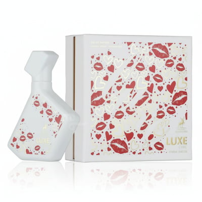 White bottle and box with red lip print and 'LUXE' branding on a white background