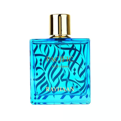 Blue perfume bottle with gold cap on a white background rayhaan pacific