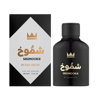 Gulf Orchid Shumookh Parfum 100ml Gulf Orchid — Black perfume bottle and its black and white patterned box with gold crown and Arabic text | Gulf Orchid Shumookh Parfum 100ml Gulf Orchid — Botol minyak wangi hitam dan kotaknya yang bercorak hitam putih dengan mahkota emas dan teks Arab