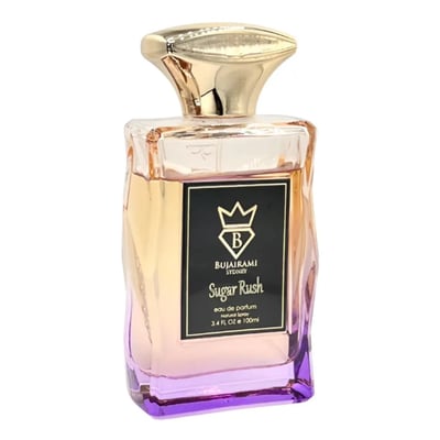 Bujairami Sugar Rush Eau de Parfum — Glass bottle with gold cap and gradient pink-blue liquid next to matching box.