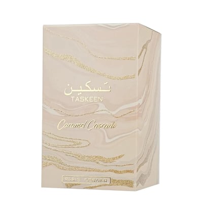 Paris Corner Taskeen Caramel Cascade 100ml — A rectangular perfume box with a marble-like pattern in beige and pink hues, accented with gold glitter stripes and gold text. | Paris Corner Taskeen Caramel Cascade 100ml — Peti minyak wangi berbentuk segi empat dengan corak seperti marmar dalam warna beige dan merah