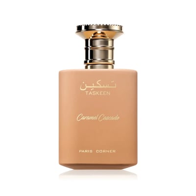 Paris Corner Taskeen Caramel Cascade 100ml — A rectangular perfume box with a marble-like pattern in beige and pink hues, accented with gold glitter stripes and gold text. | Paris Corner Taskeen Caramel Cascade 100ml — Peti minyak wangi berbentuk segi empat dengan corak seperti marmar dalam warna beige dan merah
