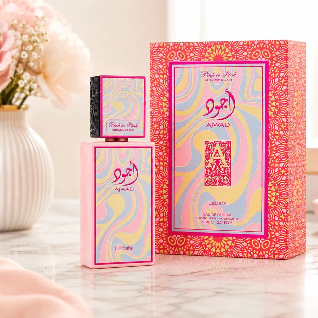 Lattafa Ajwad Pink 2 Pink Creamy Elixir EDP — Pink rectangular bottle with a colorful wavy pattern, topped with a smaller black cap featuring a similar wavy design and gold accents.
