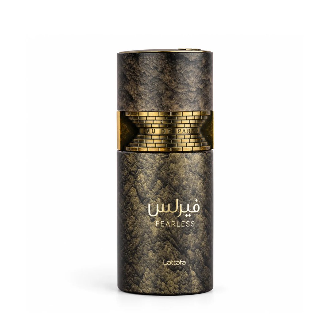 Lattafa Fearless by Lattafa 100ml EDP Men — Cylindrical dark textured bottle with gold accents and Arabic script, featuring the word FEARLESS and Lattafa branding.
