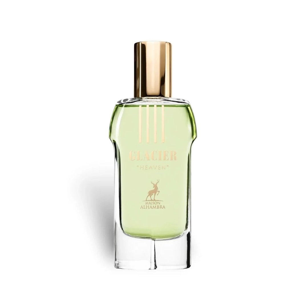 Maison Alhambra Glacier Heaven 100ml — Green floral patterned cylindrical box and a clear glass perfume bottle with green liquid and gold cap, set against a white background. | Maison Alhambra Glacier Heaven 100ml — Kotak silinder hijau bermotif bunga dan botol minyak wangi kaca jernih dengan cecair hijau dan penutup