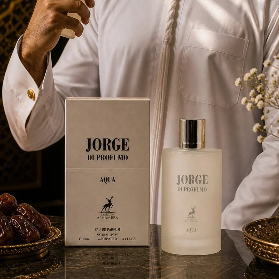 Maison Alhambra Jorge Di Profumo Aqua — A white box and a frosted glass bottle of Jorge Di Profumo Aqua perfume, with a deer logo on both. | Maison Alhambra Jorge Di Profumo Aqua — Kotak putih dan botol kaca beku minyak wangi Jorge Di Profumo Aqua, dengan logo rusa pada kedua-duanya.