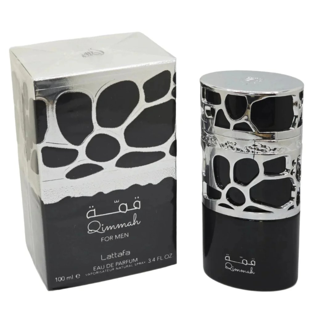 Lattafa Qimmah Eau De Parfum for Men 100ml — A black perfume box with a clear plastic overlay featuring a black and silver giraffe-like pattern sits next to a matching black perfume bottle with a silver, patterned cage-like cap. | Lattafa Qimmah Eau De Parfum for Men 100ml — Kotak minyak wangi hitam dengan lapisan