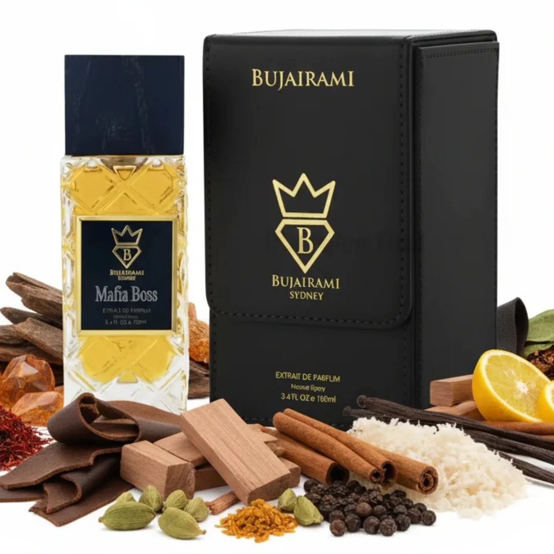 Bujairami Mafia Boss — Clear glass perfume bottle with gold liquid next to a black presentation box with gold logo and text