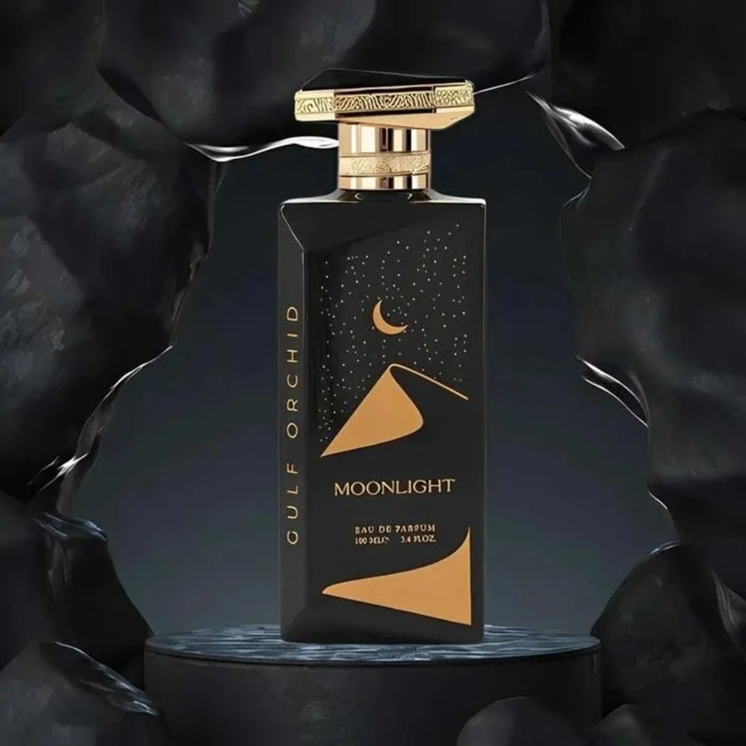 Gulf Orchid Moonlight Eau De Parfum — Black bottle with gold desert dunes and crescent moon design, gold cap | Gulf Orchid Moonlight Eau De Parfum — Botol hitam dengan reka bentuk bukit pasir emas dan bulan sabit, penutup emas