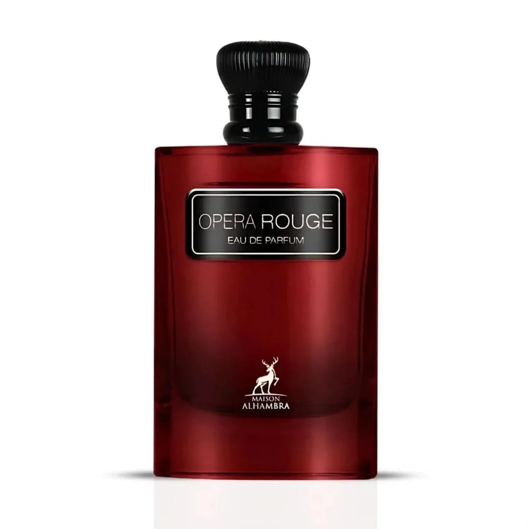 Maison Alhambra Opera Rouge — A deep red, rectangular perfume bottle with a black textured cap and a silver label reading "OPERA ROUGE EAU DE PARFUM" and a deer logo below, stands next to its matching black and red box. | Maison Alhambra Opera Rouge — Botol minyak wangi berbentuk segi empat berwarna merah pekat dengan