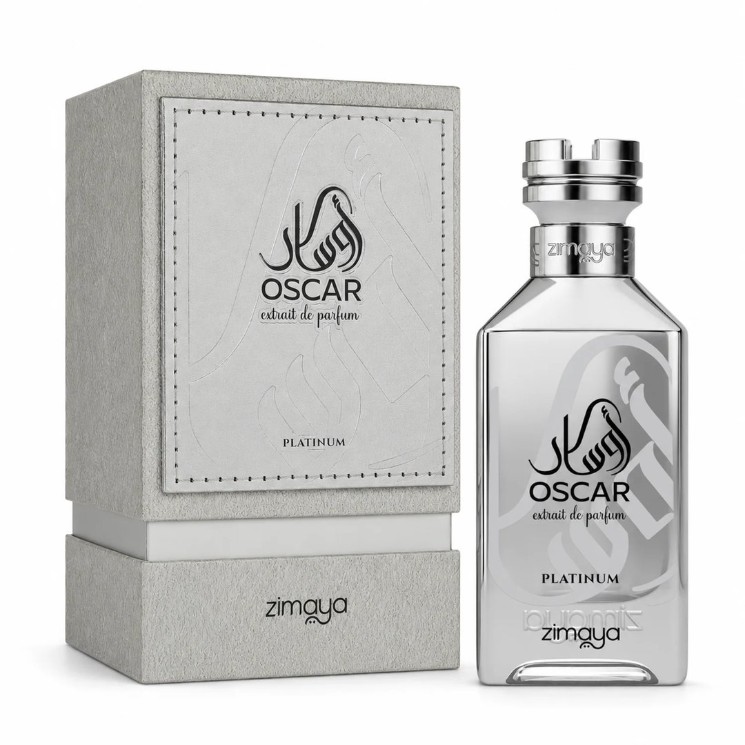 Zimaya Oscar Platinum — Silver perfume bottle and its grey textured box packaging, both featuring black Arabic calligraphy and text.