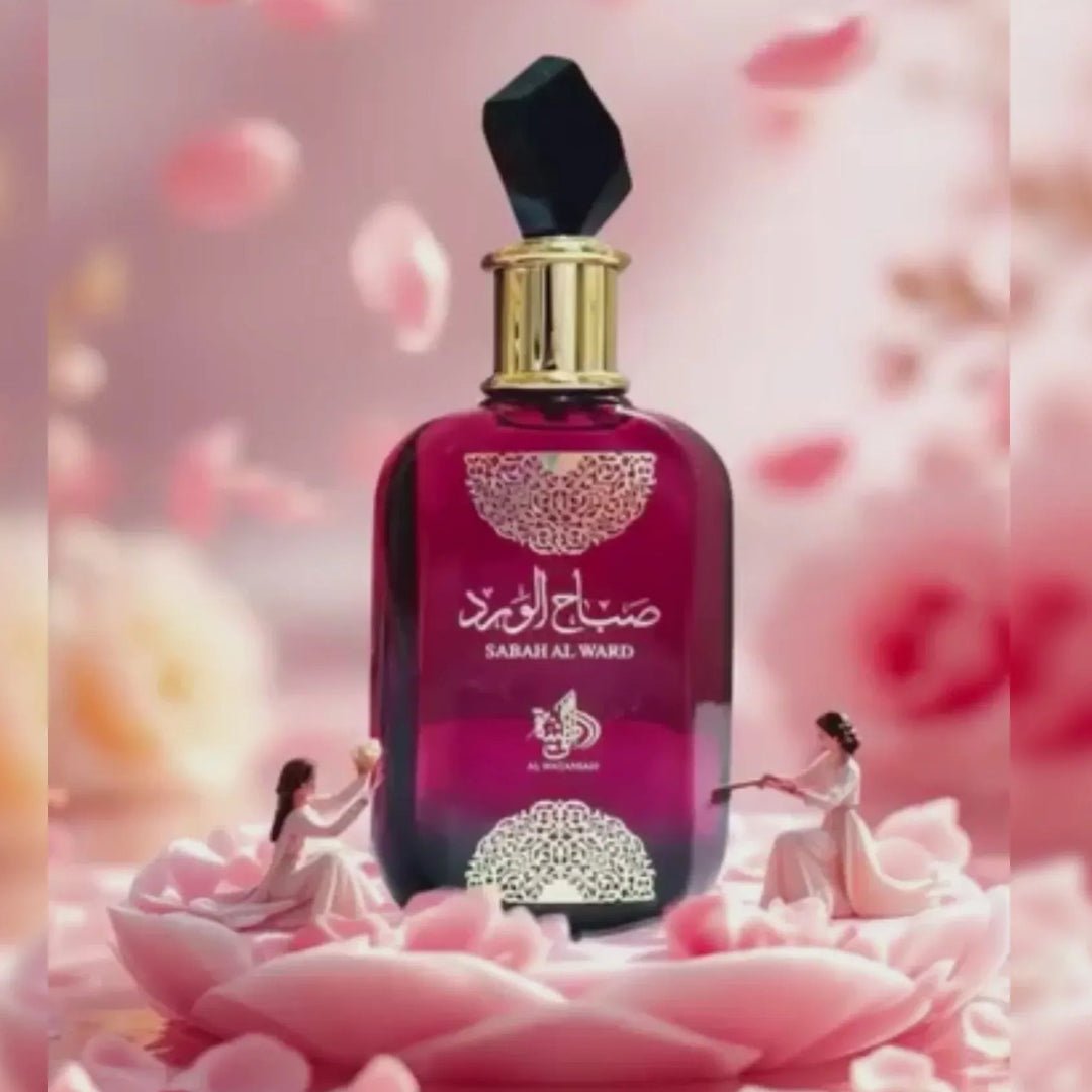 Perfume bottle with decorative design on a pink floral background