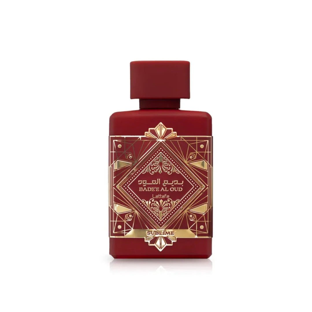 Red perfume bottle with gold design on a white background