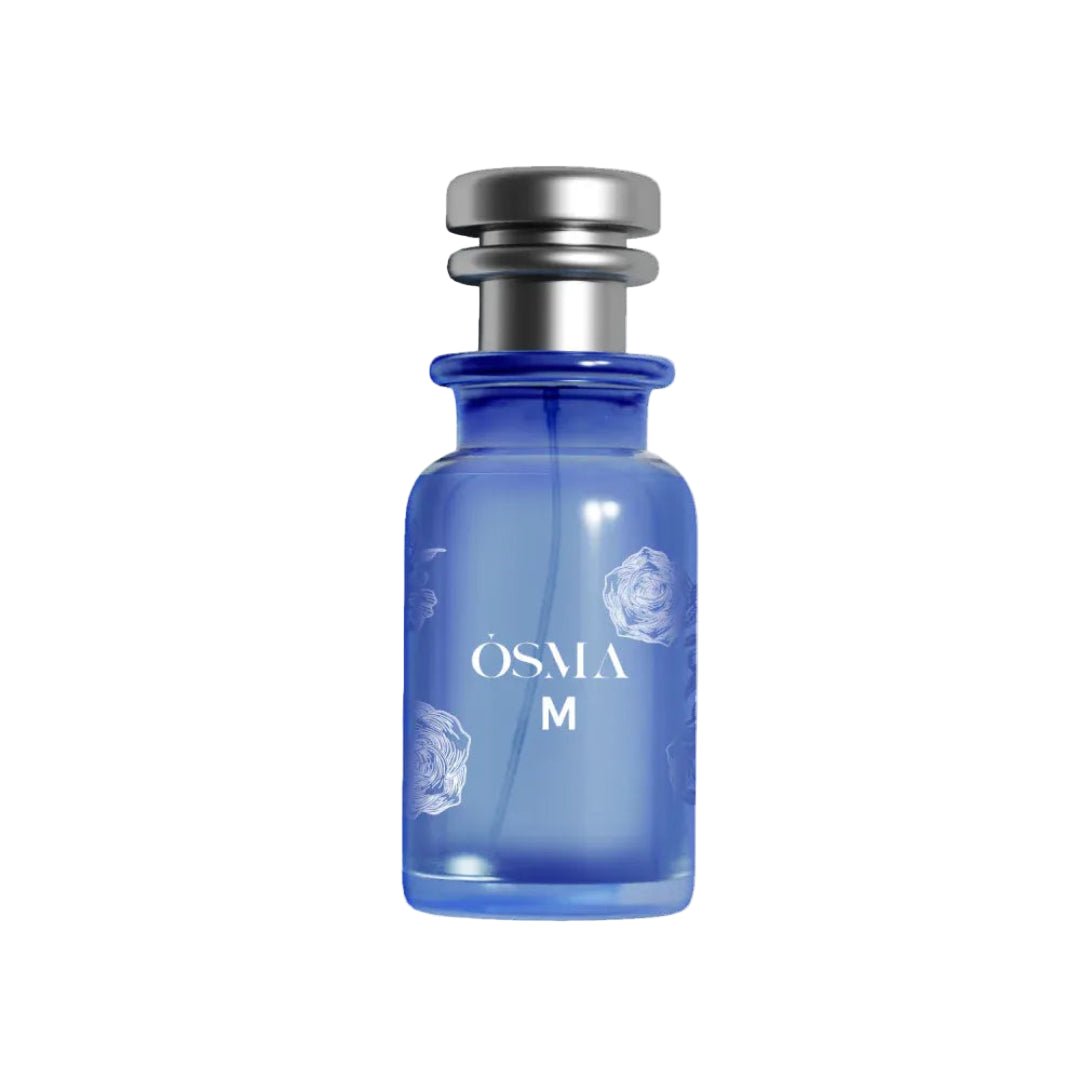 Blue perfume bottle with silver cap on a white background