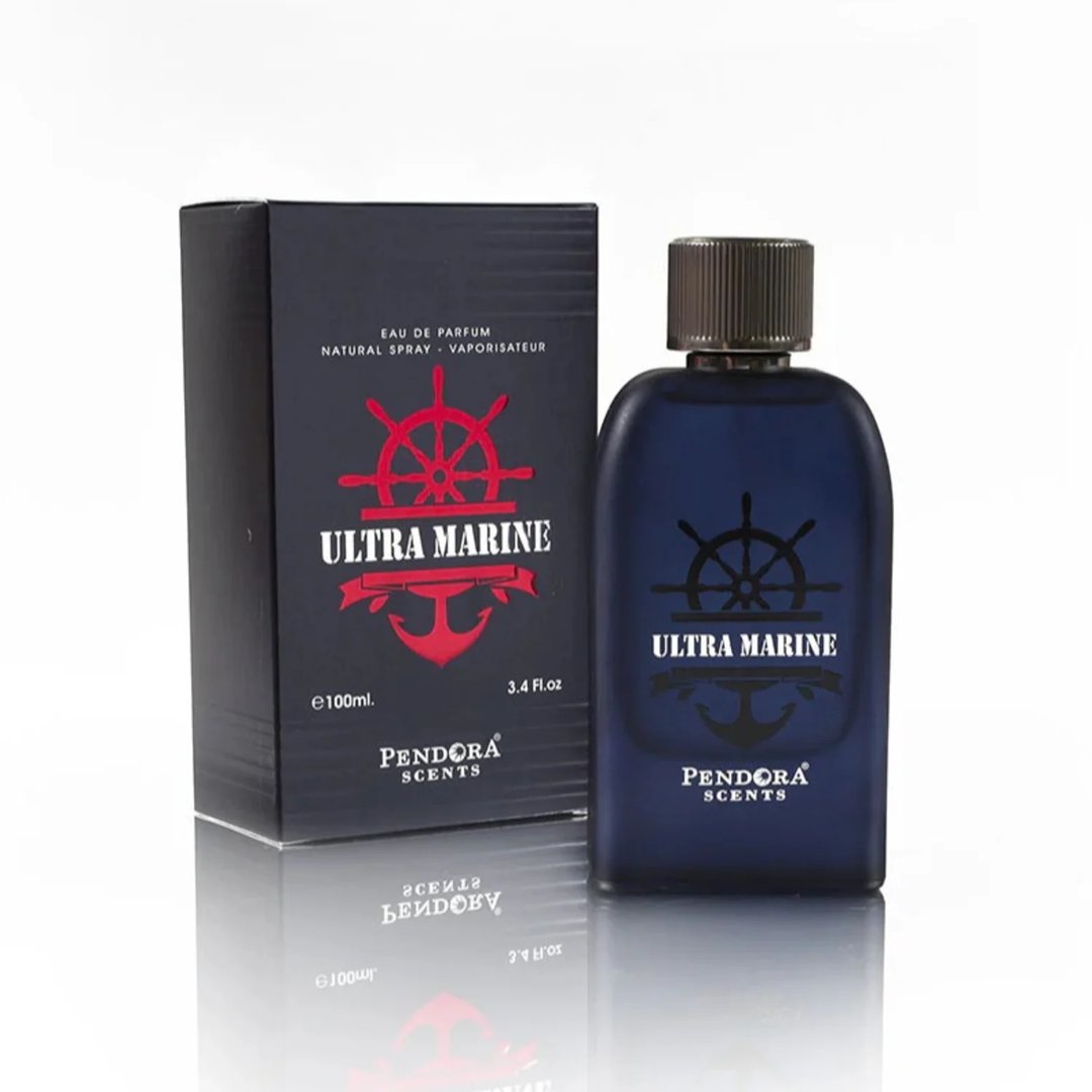 Pendora Ultra Marine 100ml — A dark blue glass perfume bottle with a silver cap stands next to its navy blue box, both featuring a red ship's wheel and anchor emblem. | Pendora Ultra Marine 100ml — Botol kaca biru gelap dengan penutup perak berdiri di sebelah kotak biru navinya, kedua-duanya menampilkan lambang roda