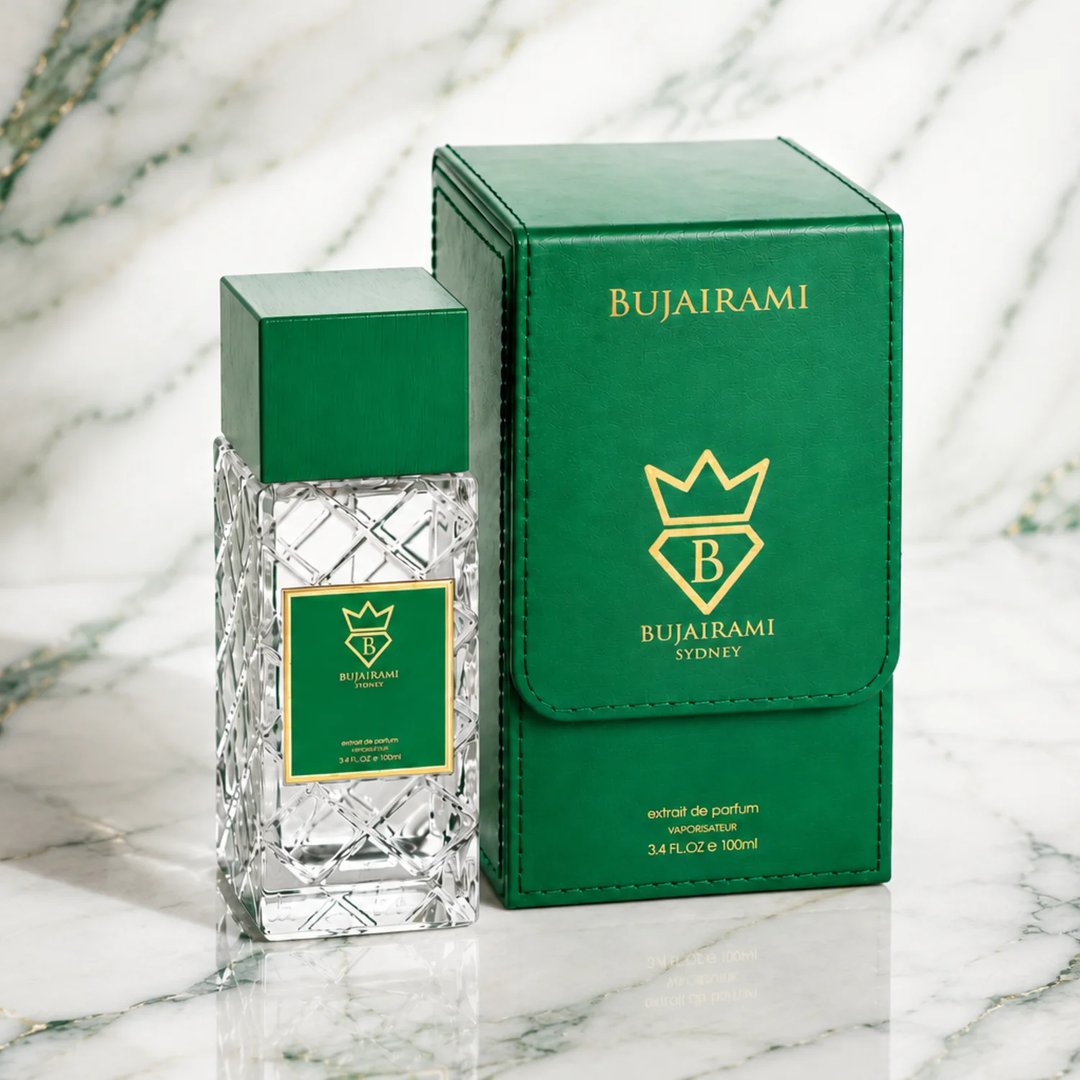 Bujairami Vibration by Bujairami 100ml Extrait de Parfum — Clear glass bottle with green cap and label next to a green
