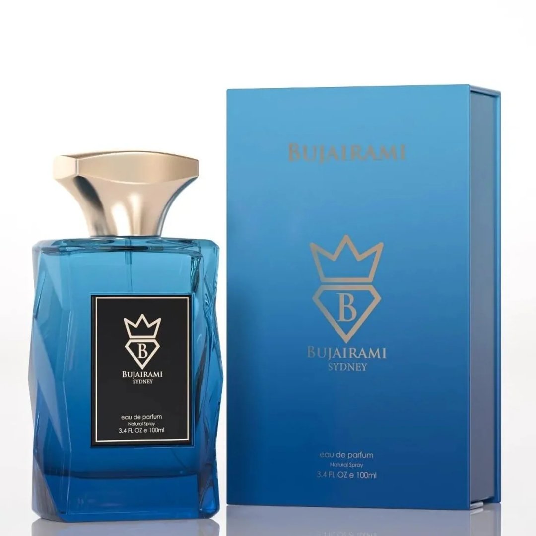 Bujairami Enforcer Eau de Parfum — Blue faceted glass bottle with gold cap next to blue box with gold logo