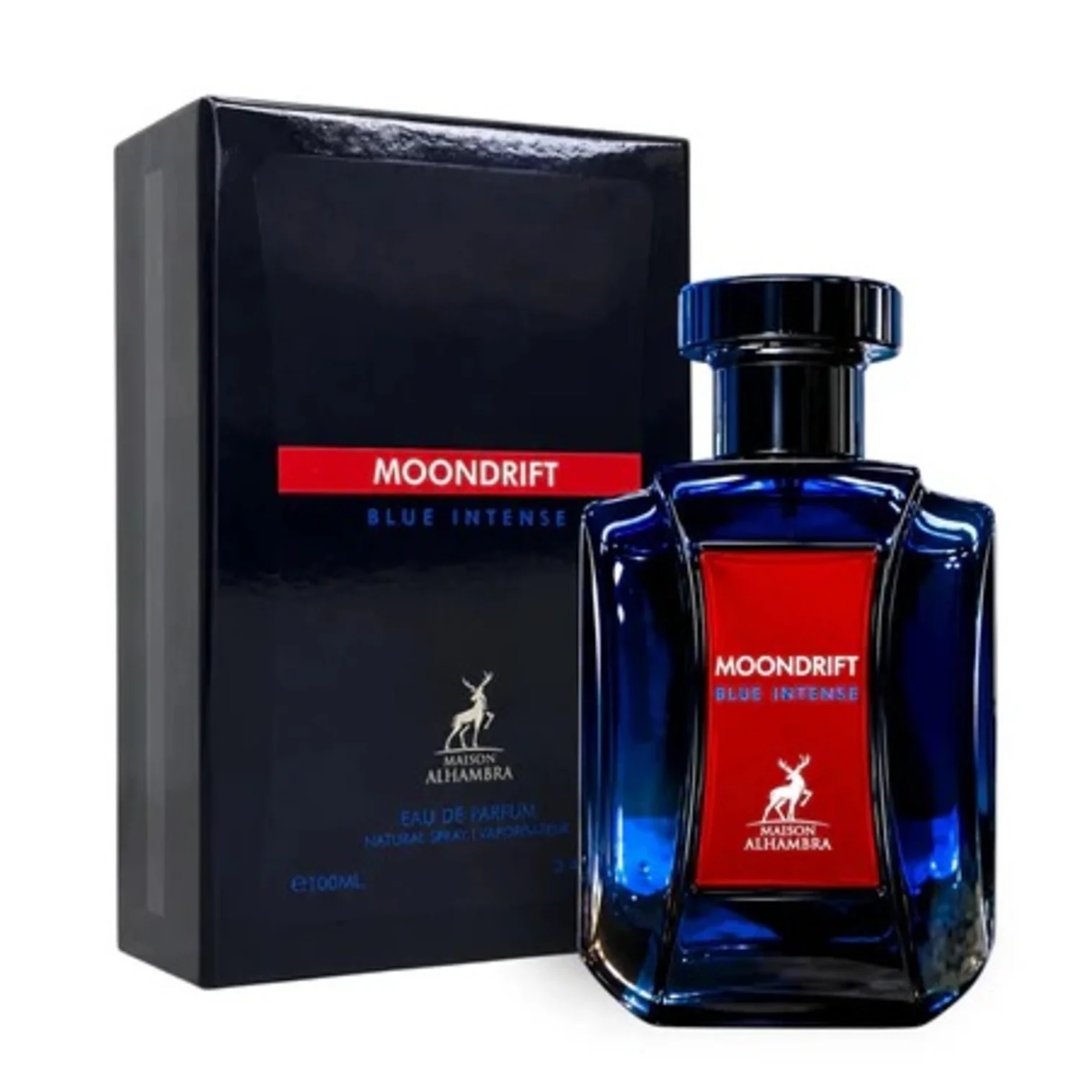 Maison Alhambra Moondrift Blue Intense 100ml Alhambra — A blue glass perfume bottle with a red label and a matching blue box with a red label, both featuring a deer logo and text. | Maison Alhambra Moondrift Blue Intense 100ml Alhambra — Botol kaca biru dengan label merah dan kotak biru sepadan dengan label merah