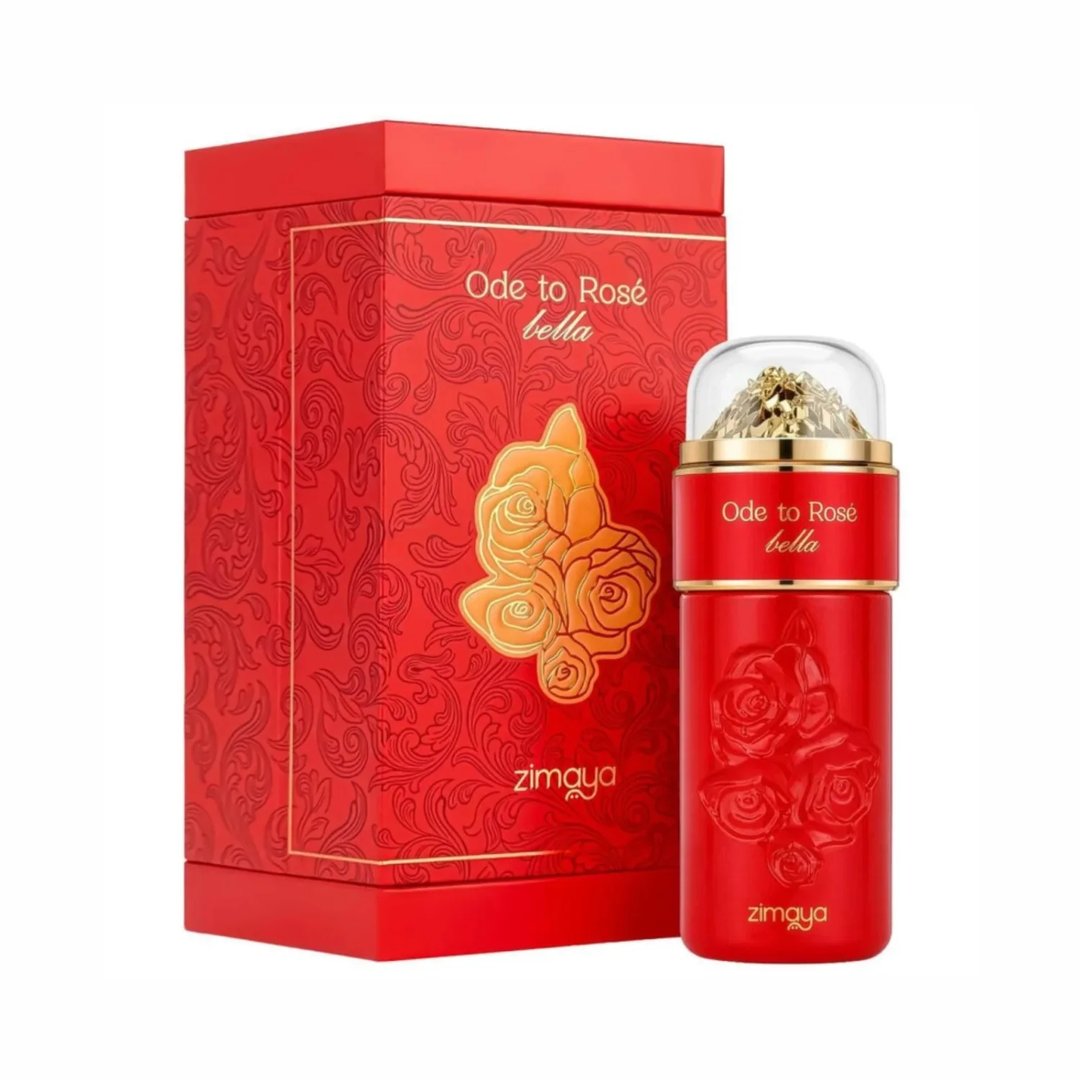 Zimaya Ode to Rose Bella Eau De Parfum — A red perfume bottle with embossed roses and a gold-accented clear cap sits next to its matching red patterned gift box with embossed gold roses. | Zimaya Ode to Rose Bella Eau De Parfum — Botol minyak wangi merah dengan bunga ros timbul dan penutup jernih beraksen emas