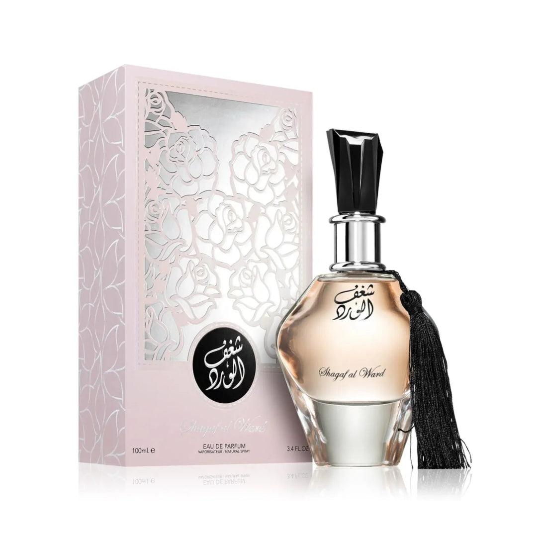 Perfume bottle with tassel and packaging on a white background