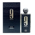 Afnan 9 PM Night Out Extrait de Parfum — A black textured perfume bottle with a dark textured cap stands next to its matching black textured box, both featuring a large white '9 PM Night Out' logo. | Afnan 9 PM Night Out Extrait de Parfum — Botol minyak wangi bertekstur hitam dengan penutup bertekstur gelap berdiri di
