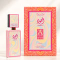 Lattafa Ajwad Pink 2 Pink Creamy Elixir EDP — Pink rectangular bottle with a colorful wavy pattern, topped with a smaller black cap featuring a similar wavy design and gold accents.
