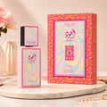 Lattafa Ajwad Pink 2 Pink Creamy Elixir EDP — Pink rectangular bottle with a colorful wavy pattern, topped with a smaller black cap featuring a similar wavy design and gold accents.