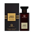 Grandeur Amber Leather 100ml by Grandeur Perfumes — A dark glass perfume bottle with a gold label sits next to its black and gold striped box on a white background. | Grandeur Amber Leather 100ml oleh Grandeur Perfumes — Botol minyak wangi kaca gelap dengan label emas duduk di sebelah kotaknya yang berjalur hitam dan