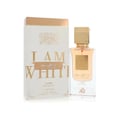 Lattafa Ana Abiyedh Poudree by Lattafa 60ml — A white perfume box with gold accents and Arabic calligraphy stands next to a clear glass perfume bottle with a gold cap and intricate gold detailing on the bottle. | Lattafa Ana Abiyedh Poudree by Lattafa 60ml — Kotak minyak wangi putih dengan aksen emas dan kaligrafi