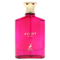 Maison Alhambra Avant Ruby Eau De Parfum 100ml — A bright pink glass perfume bottle with a gold textured cap stands next to its white and gold patterned box, both featuring the Avant Ruby branding and a deer logo. | Maison Alhambra Avant Ruby Eau De Parfum 100ml — Botol kaca berwarna merah jambu terang dengan penutup