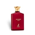 Maison Alhambra Avant Ruby Eau De Parfum 100ml — A bright pink glass perfume bottle with a gold textured cap stands next to its white and gold patterned box, both featuring the Avant Ruby branding and a deer logo. | Maison Alhambra Avant Ruby Eau De Parfum 100ml — Botol kaca berwarna merah jambu terang dengan penutup