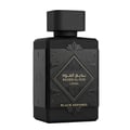 Lattafa Badee Al Oud Lattafa Black Exposed 100ml — Black perfume bottle and its gold-accented box, displayed side-by-side on a white background.